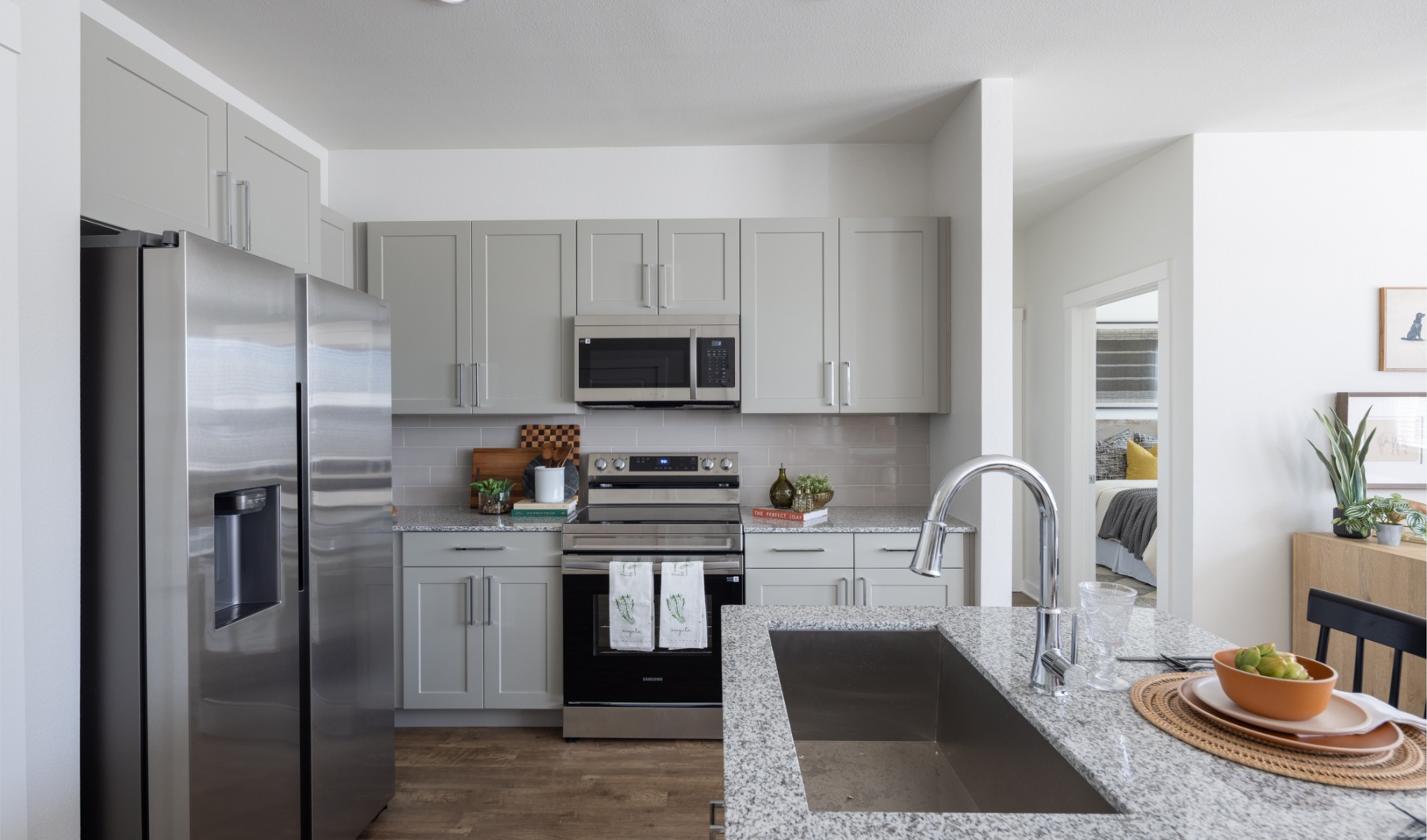 Kitchen with Island and Smart Stainless Steel Appliances