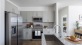 Kitchen with Island and Smart Stainless Steel Appliances