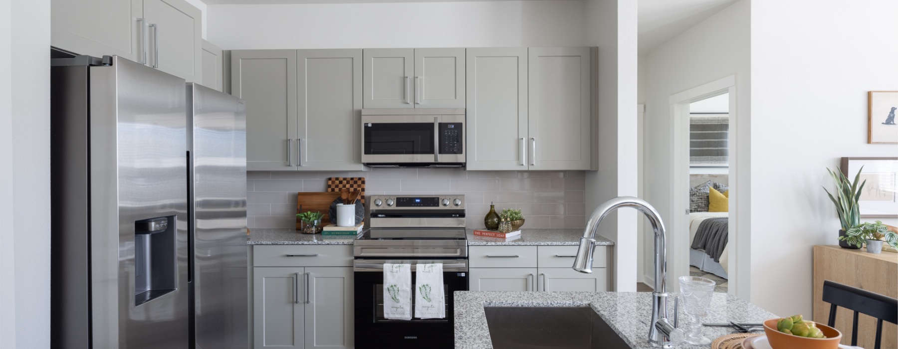 Kitchen with Island and Smart Stainless Steel Appliances