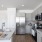 Kitchen with Island and Smart Stainless Steel Appliances