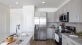 Kitchen with Island and Smart Stainless Steel Appliances