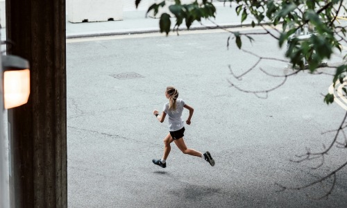 Entertainment and Recreational a woman running outdoors